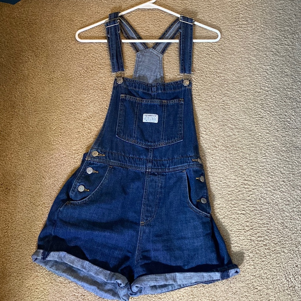 Levi’s denim shortalls, medium wash.